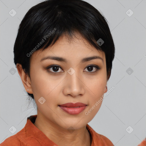 Joyful asian young-adult female with short  black hair and brown eyes