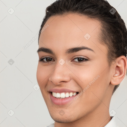 Joyful white young-adult female with short  brown hair and brown eyes