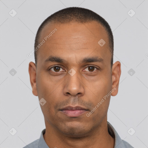 Neutral latino adult male with short  black hair and brown eyes