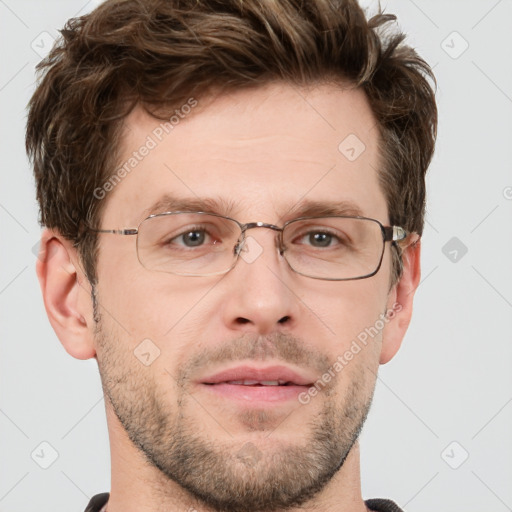 Joyful white adult male with short  brown hair and grey eyes