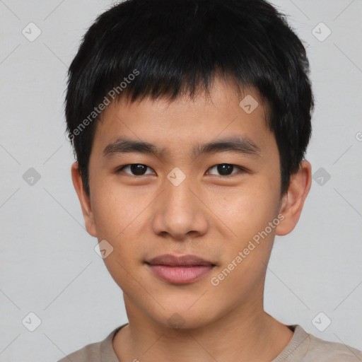 Joyful asian young-adult male with short  black hair and brown eyes