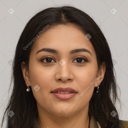 Joyful latino young-adult female with long  brown hair and brown eyes