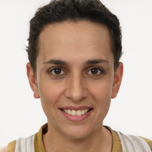 Joyful white young-adult female with short  brown hair and brown eyes