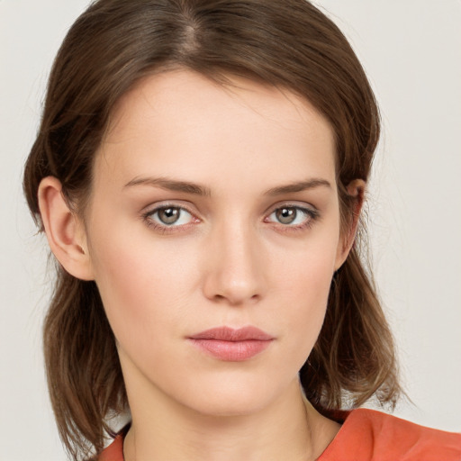 Neutral white young-adult female with medium  brown hair and blue eyes