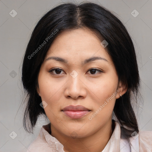 Joyful asian young-adult female with medium  black hair and brown eyes