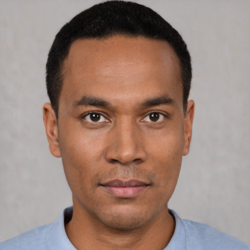 Neutral black young-adult male with short  black hair and brown eyes