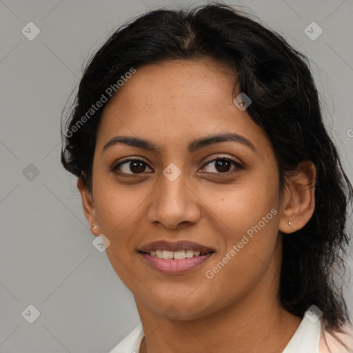 Joyful latino young-adult female with medium  brown hair and brown eyes