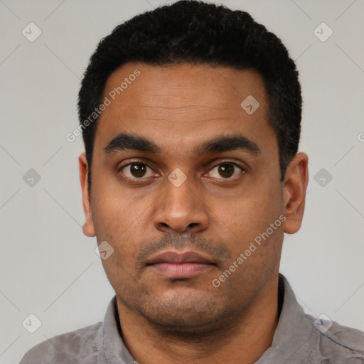 Neutral latino young-adult male with short  black hair and brown eyes
