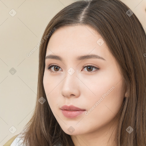 Neutral white young-adult female with long  brown hair and brown eyes