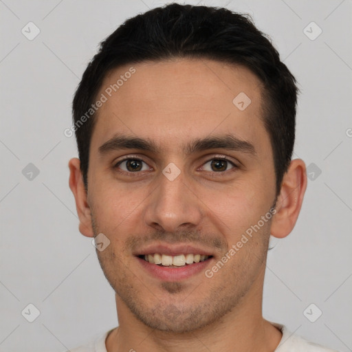 Joyful white young-adult male with short  brown hair and brown eyes