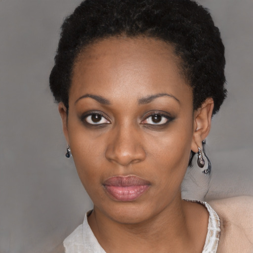 Neutral black young-adult female with short  black hair and brown eyes