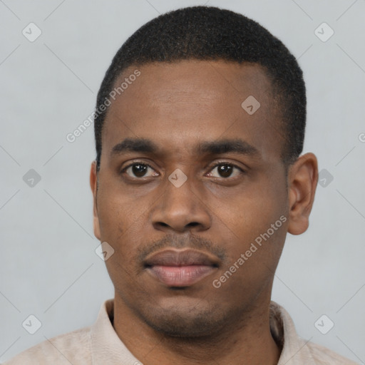 Neutral latino young-adult male with short  black hair and brown eyes