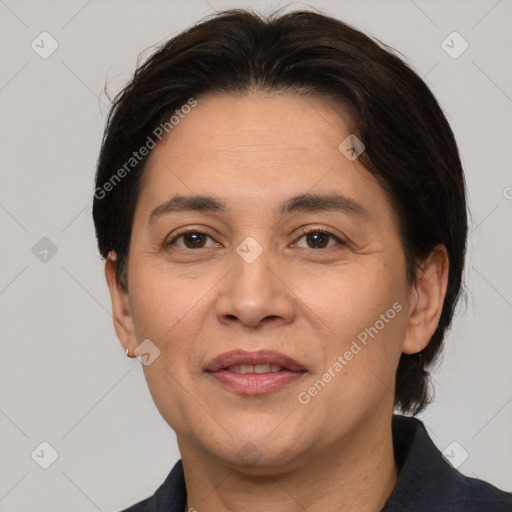 Joyful white adult female with medium  brown hair and brown eyes