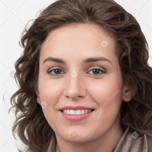 Joyful white young-adult female with medium  brown hair and green eyes