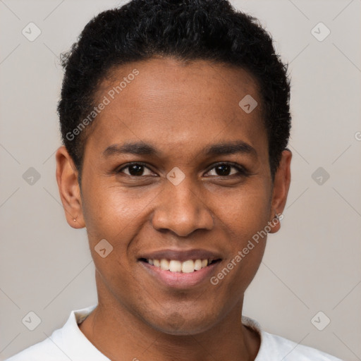 Joyful black young-adult male with short  black hair and brown eyes