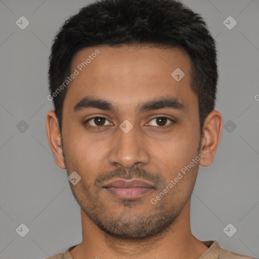 Neutral latino young-adult male with short  black hair and brown eyes