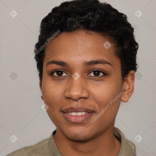 Joyful black young-adult female with short  black hair and brown eyes