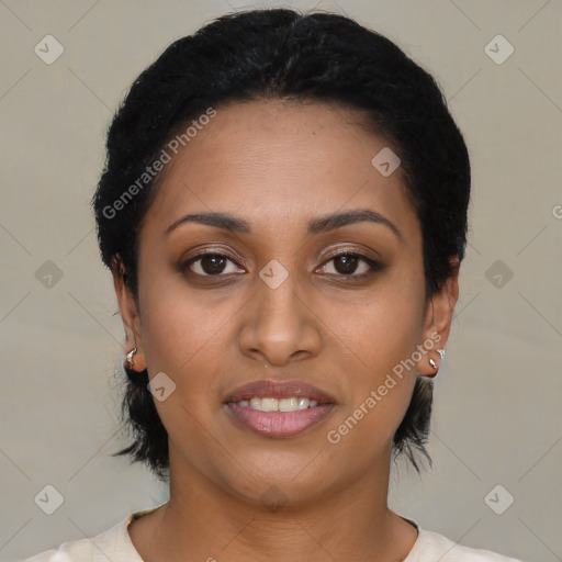 Joyful latino young-adult female with short  black hair and brown eyes