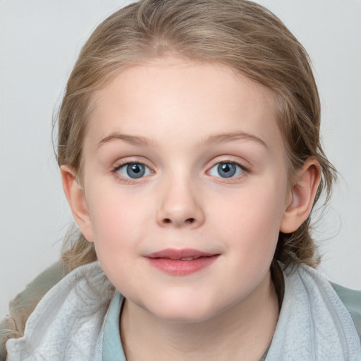 Joyful white child female with medium  brown hair and blue eyes