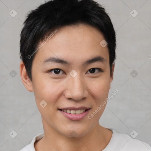 Joyful asian young-adult male with short  black hair and brown eyes