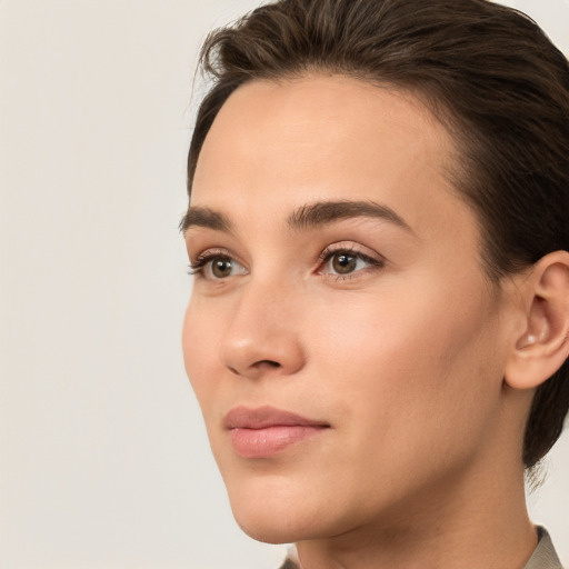 Neutral white young-adult female with medium  brown hair and brown eyes