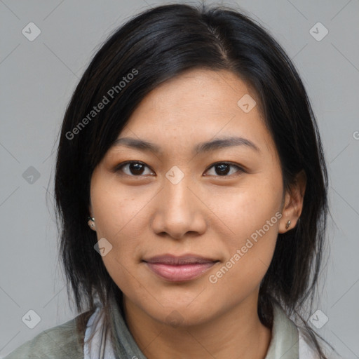 Joyful asian young-adult female with medium  black hair and brown eyes