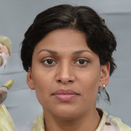 Joyful white young-adult female with medium  brown hair and brown eyes