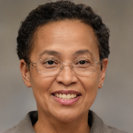 Joyful white middle-aged female with short  brown hair and brown eyes