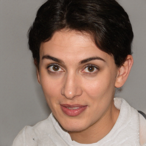 Joyful white young-adult female with short  brown hair and brown eyes