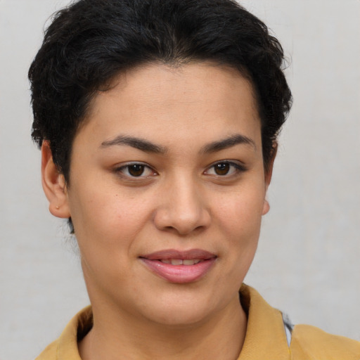 Joyful asian young-adult female with short  brown hair and brown eyes
