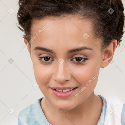 Joyful white child female with short  brown hair and brown eyes