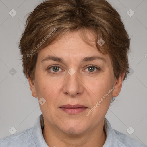 Joyful white adult female with short  brown hair and brown eyes