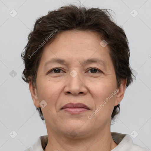 Joyful white adult female with short  brown hair and brown eyes