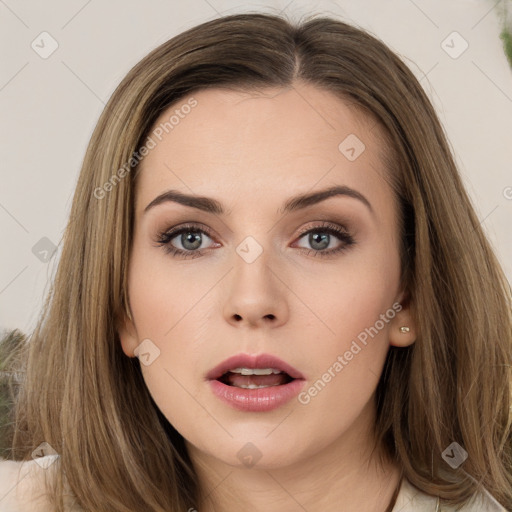 Neutral white young-adult female with long  brown hair and brown eyes