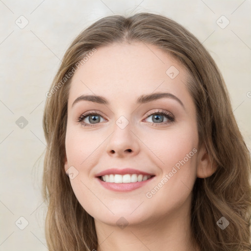 Joyful white young-adult female with long  brown hair and green eyes