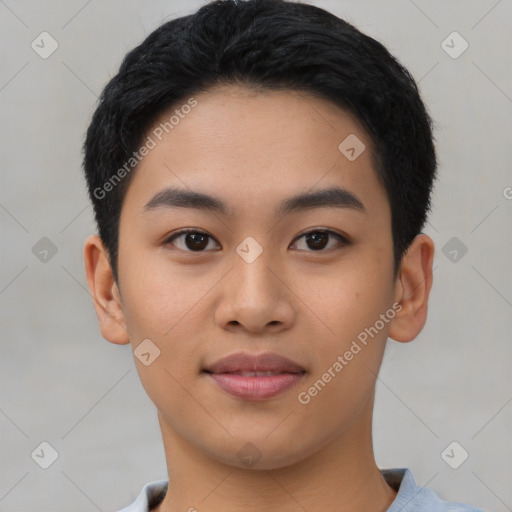 Joyful asian young-adult male with short  black hair and brown eyes