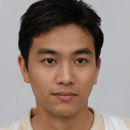 Neutral asian young-adult male with short  brown hair and brown eyes