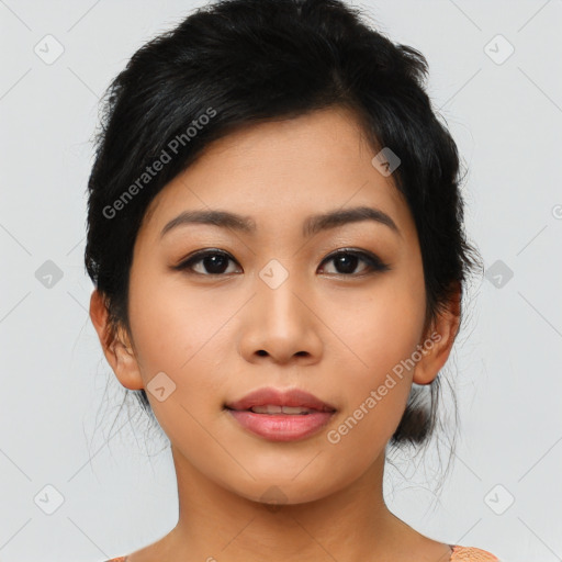 Joyful asian young-adult female with medium  black hair and brown eyes