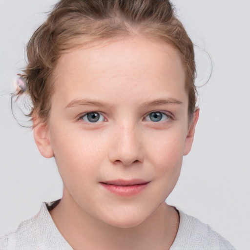 Joyful white child female with short  brown hair and blue eyes