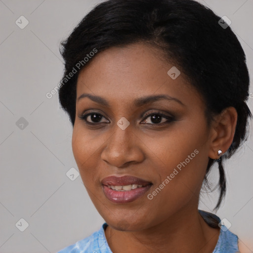 Joyful black young-adult female with medium  black hair and brown eyes