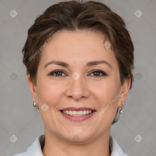 Joyful white adult female with short  brown hair and brown eyes