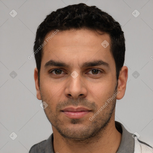 Neutral white young-adult male with short  black hair and brown eyes