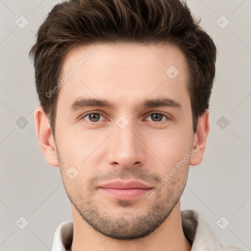 Neutral white young-adult male with short  brown hair and brown eyes