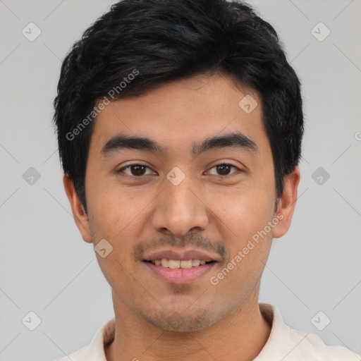 Joyful latino young-adult male with short  black hair and brown eyes