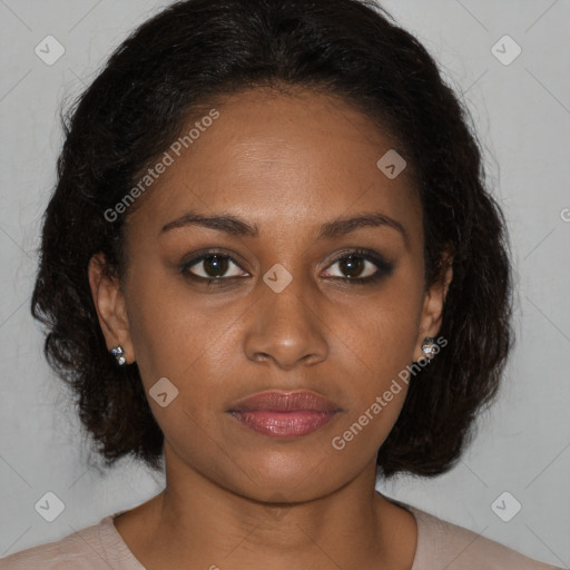 Joyful black young-adult female with medium  brown hair and brown eyes