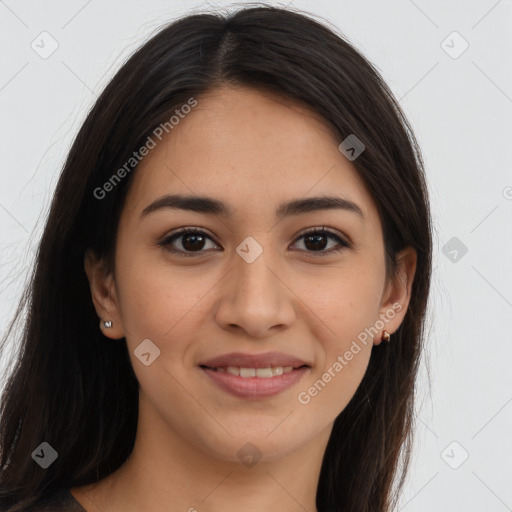 Joyful latino young-adult female with long  brown hair and brown eyes