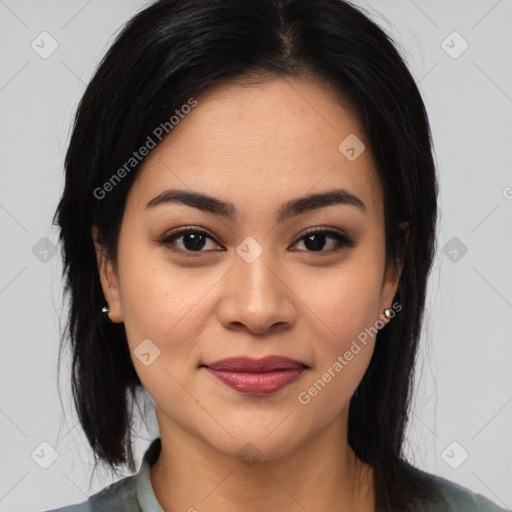 Joyful latino young-adult female with medium  brown hair and brown eyes