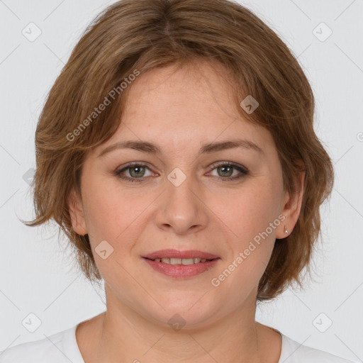 Joyful white young-adult female with medium  brown hair and grey eyes