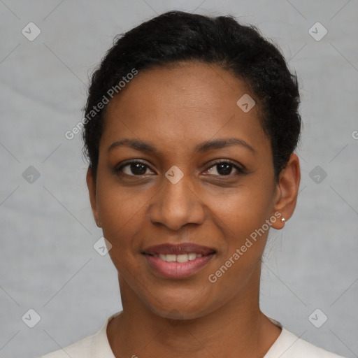 Joyful latino young-adult female with short  brown hair and brown eyes