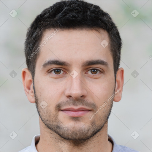 Neutral white young-adult male with short  brown hair and brown eyes